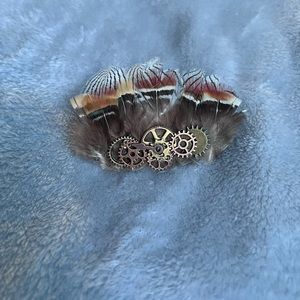 Steampunk style feathered hairpiece